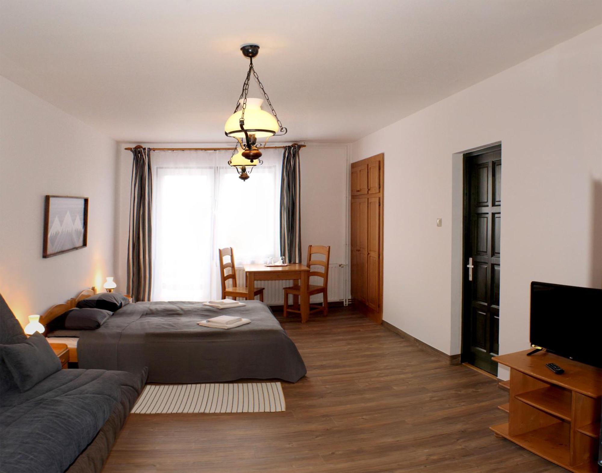 Hotel Sugo Panzio Madarasi Hargita à Izvoare  Extérieur photo