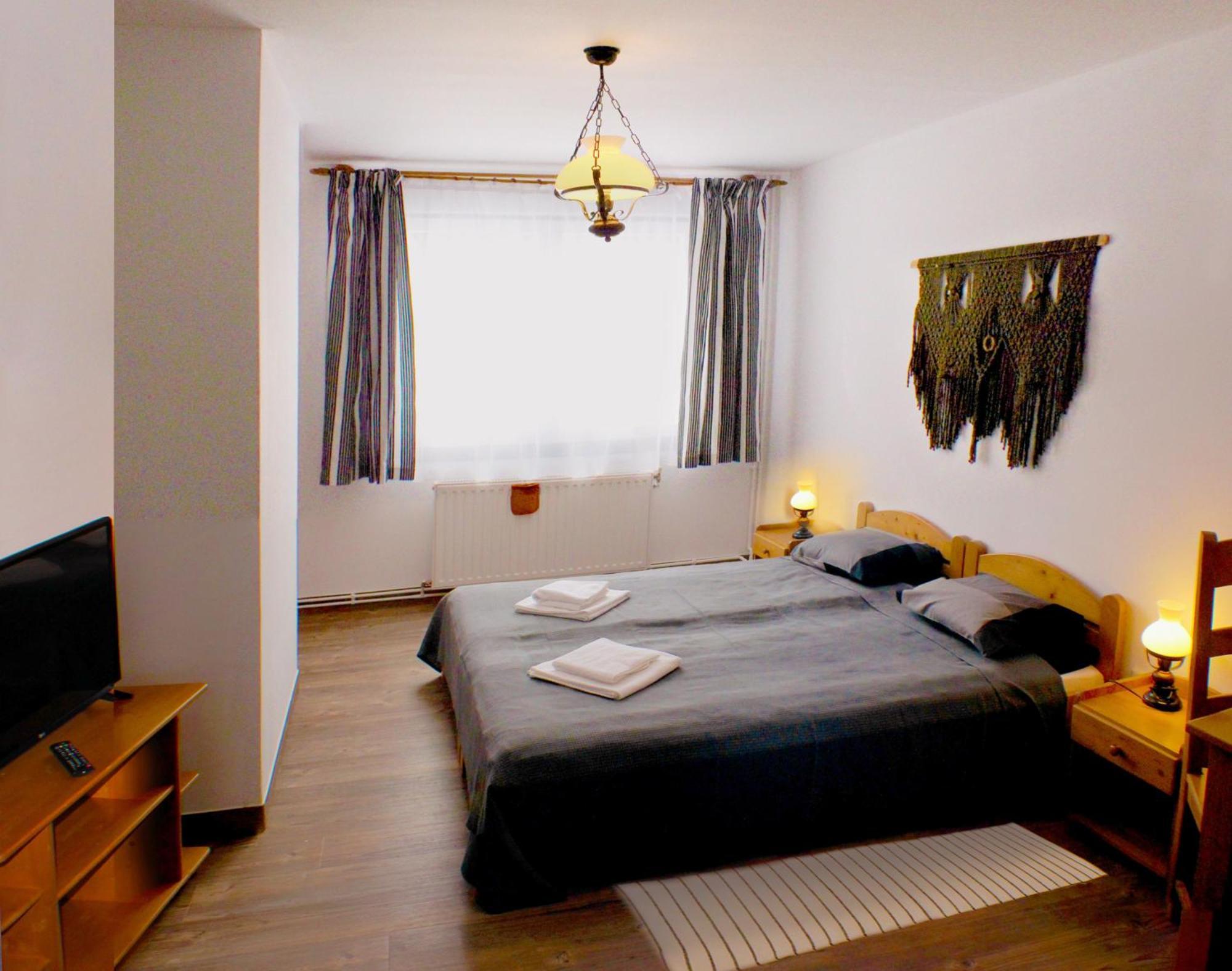 Hotel Sugo Panzio Madarasi Hargita à Izvoare  Extérieur photo